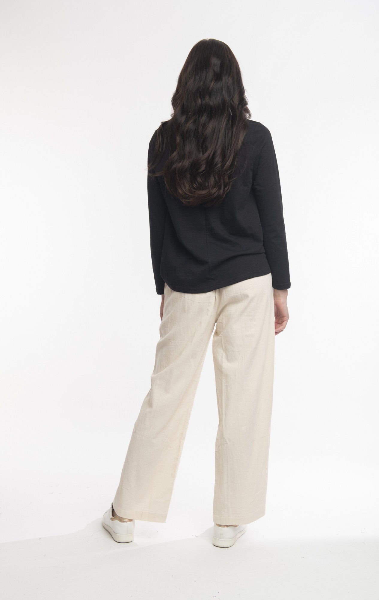 Solid cord flared trousers in Ecru