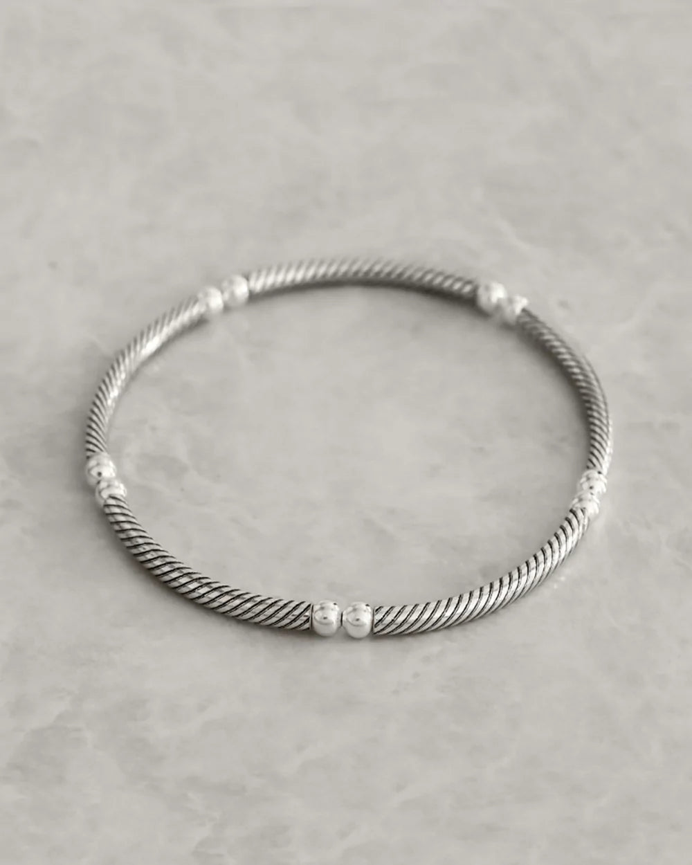 Petals Sterling Silver twisted bar elastic bracelet