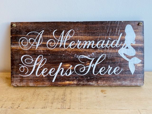 A Mermaid Sleeps Here Sign