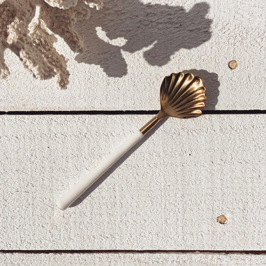 Gold clam shell spoon