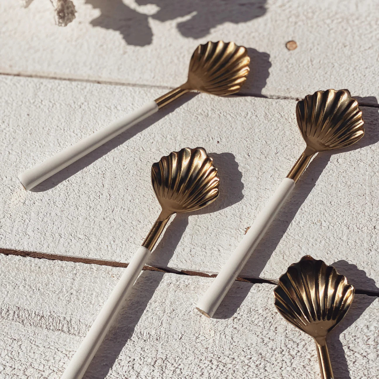 Gold clam shell spoon