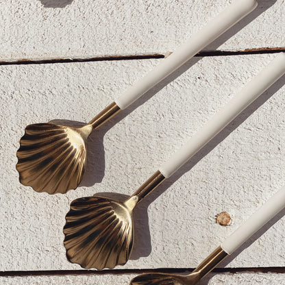 Gold clam shell spoon