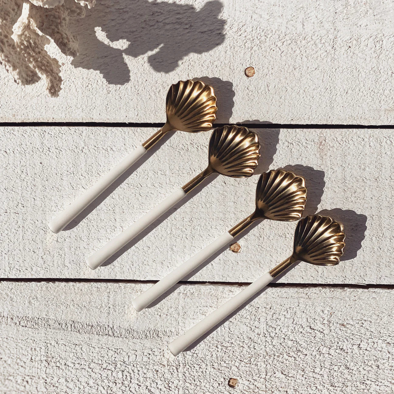 Gold clam shell spoon