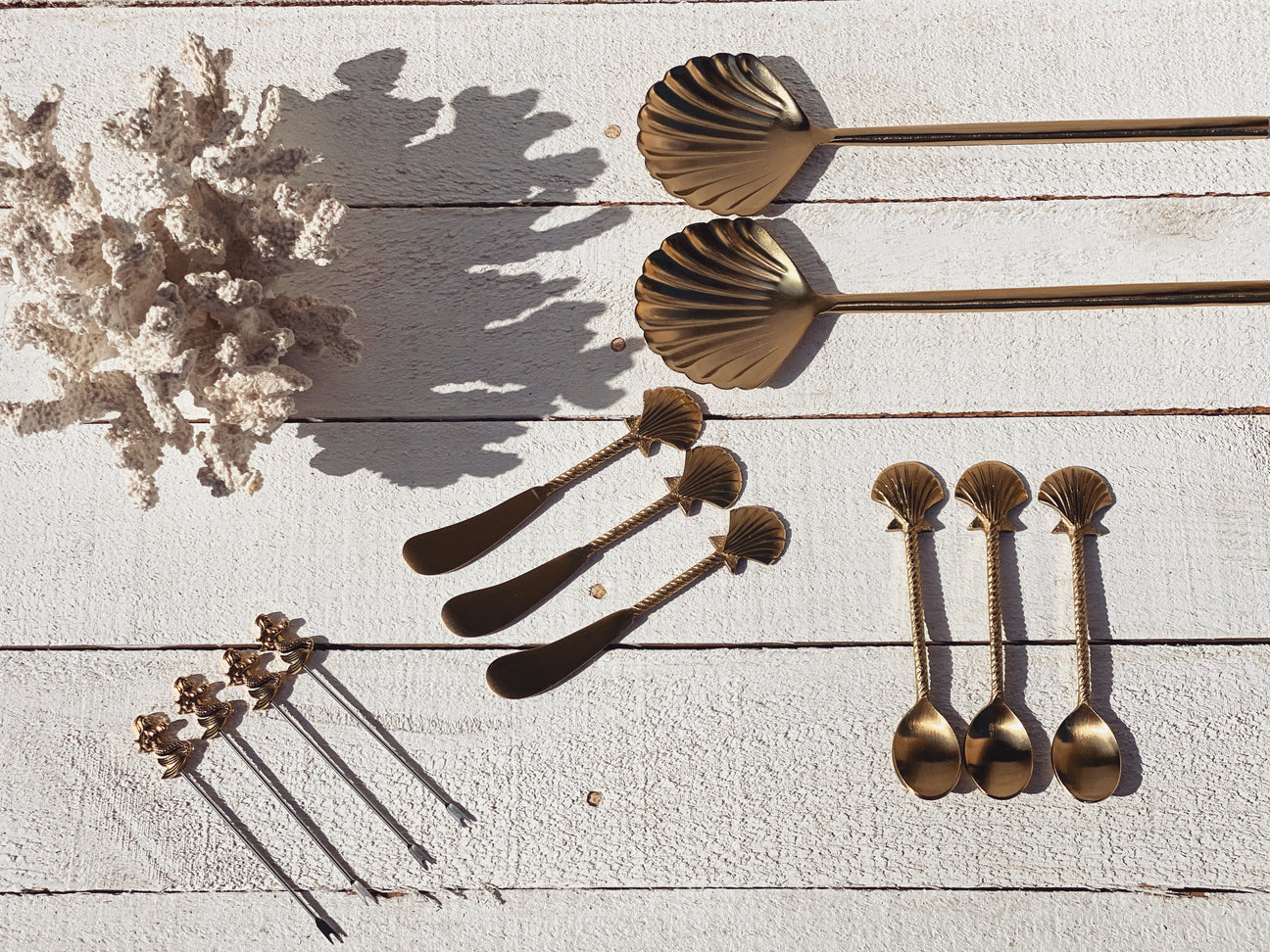 Gold clam shell spoon