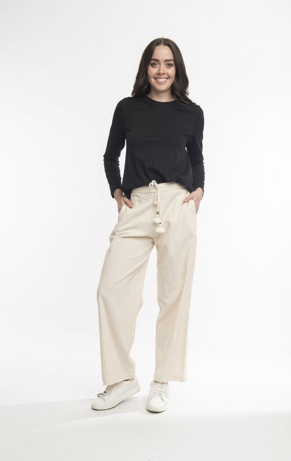 Solid cord flared trousers in Ecru
