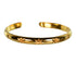 Gold bangle with gem stone