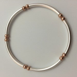 Rose Gold-filled bracelet with tubes.