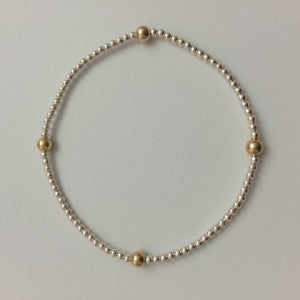 Gold-filled bracelet with balls.